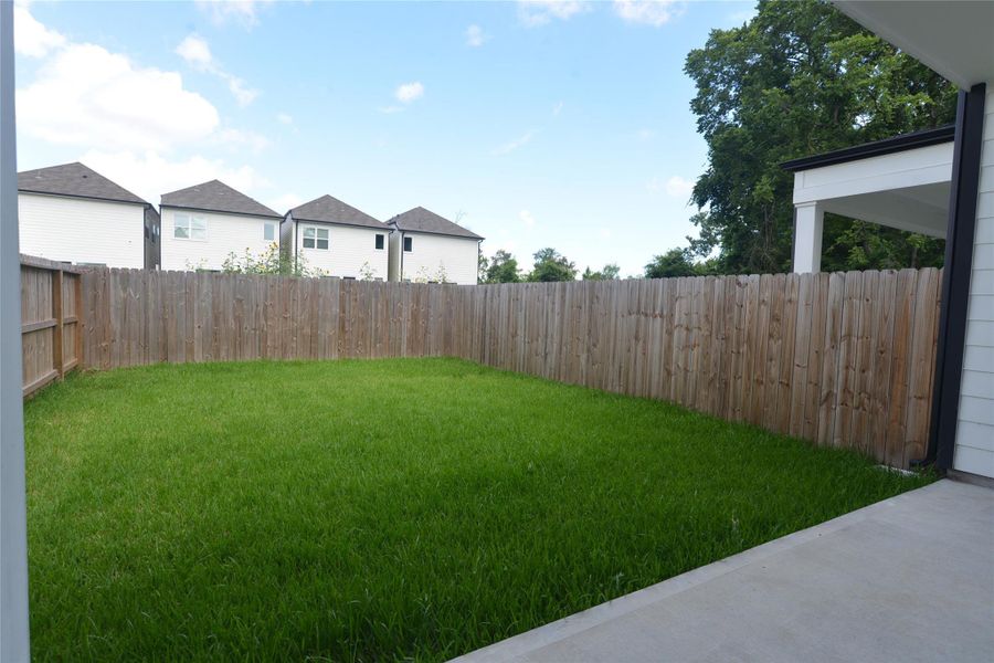 Exterior details and patio area of a home in , Houston (Image 3). Exterior details and patio area of a home in , Houston (Image 3).