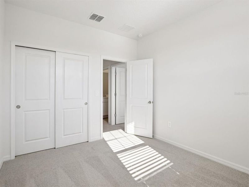 Spacious, unfurnished interior of a new home in Coasterra - Reserve Series, Palmetto (Image 36).