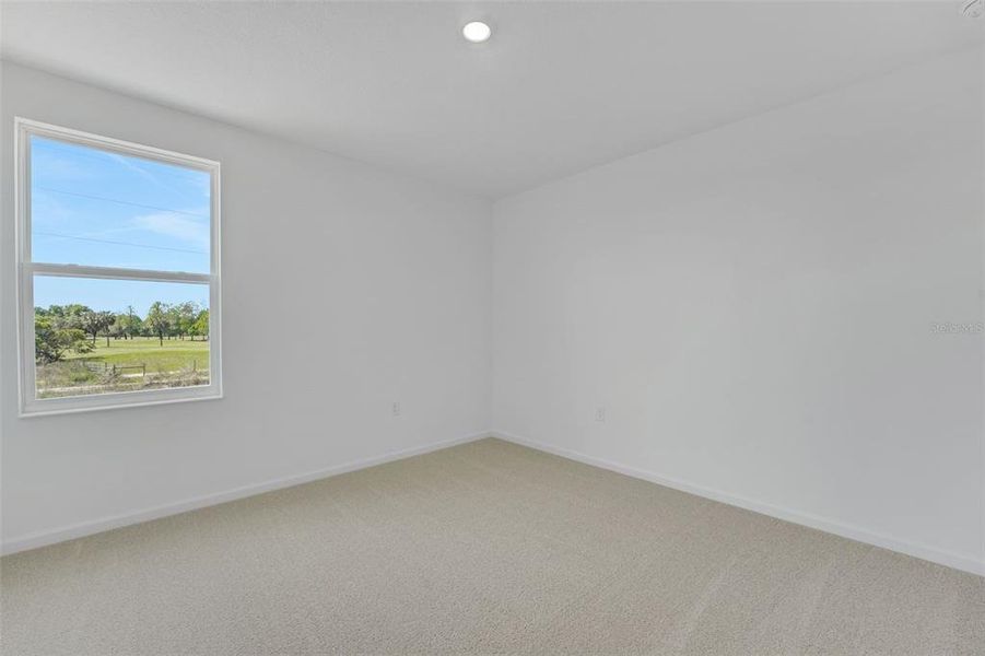 Spacious, unfurnished interior of a new home in Willowbrook North, Winter Haven (Image 17).