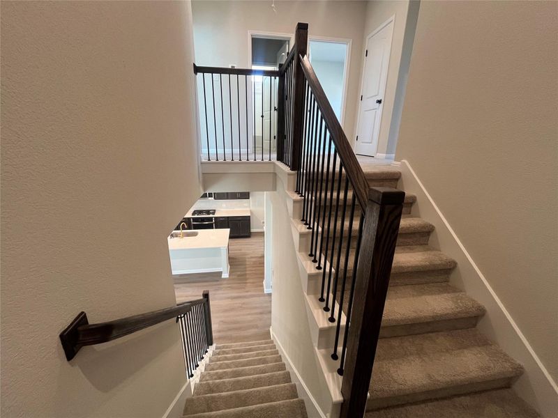 Furnished interior view inside a new home in The Cottages at Lariat, Liberty Hill (Image 6).