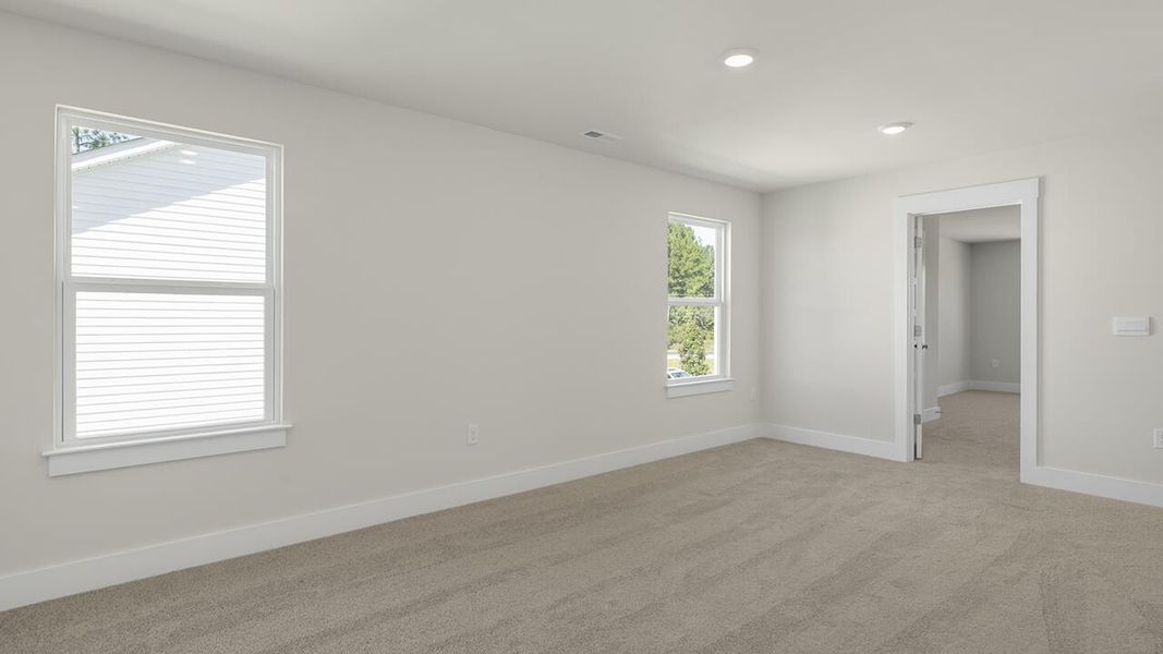 Spacious, unfurnished interior of a new home in Sidbury Station, Castle Hayne (Image 27).