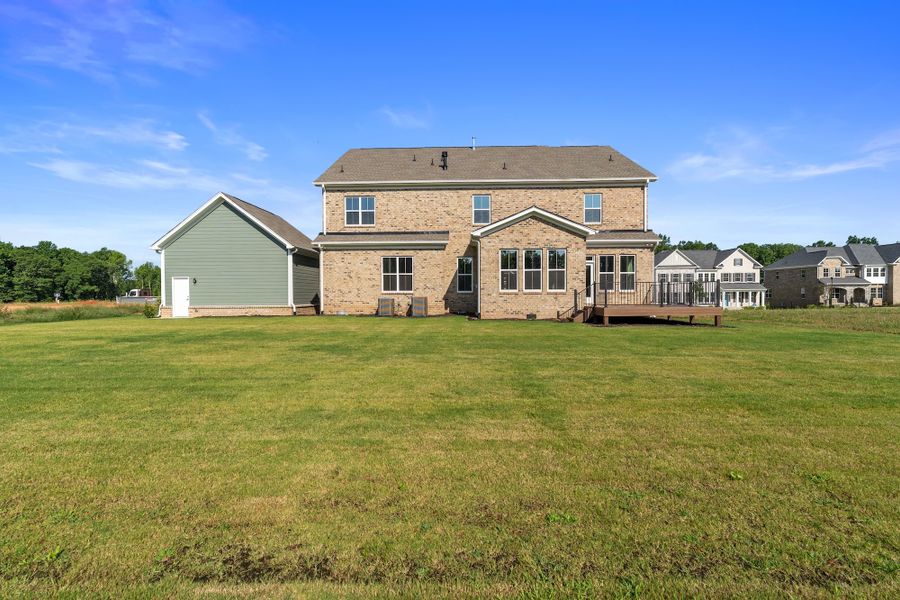 Exterior details and patio area of a home in Walnut Grove, Easley (Image 31).