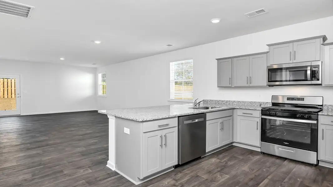 Representative furnished interior of a home built from the CAMERON by D.R. Horton in Hunter's Branch, Hopkins (Image 4).