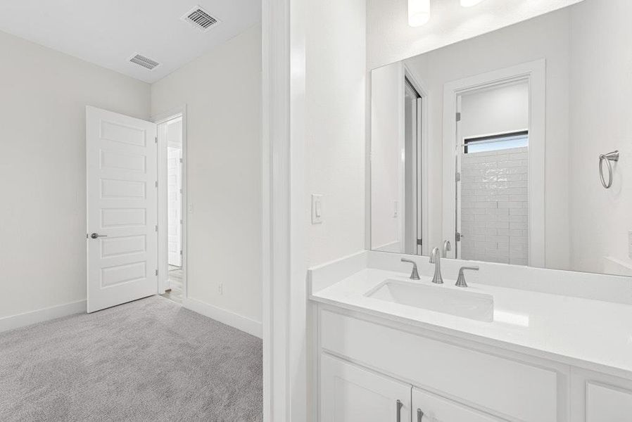 Furnished interior view inside a new home in Riverstone, Georgetown (Image 7).
