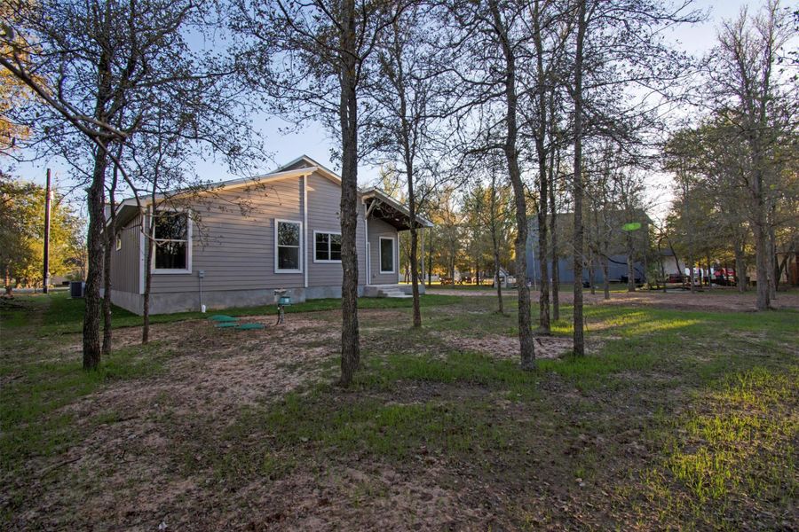 Exterior details and patio area of a home in , Bastrop (Image 27).