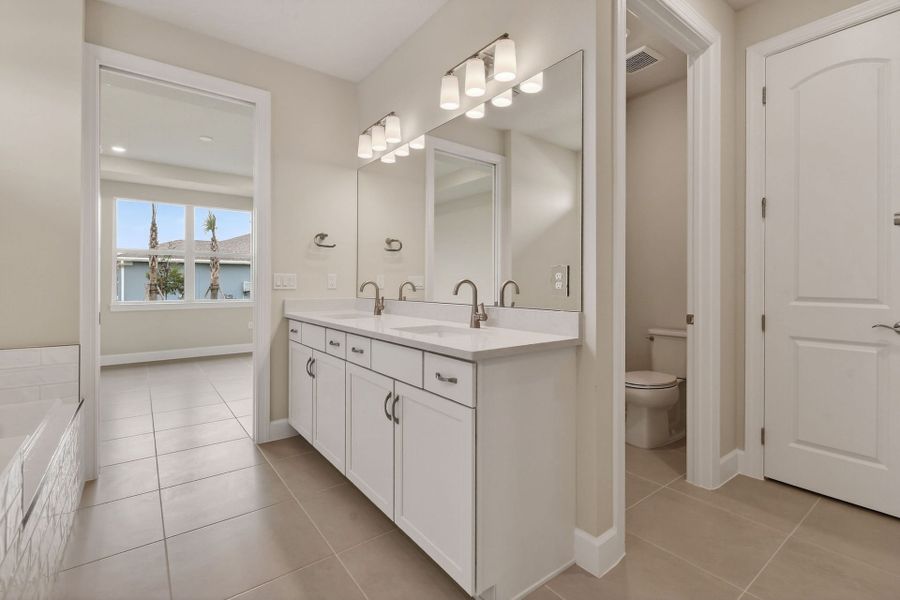 Furnished interior view inside a new home in Del Webb Tradition, Port St. Lucie (Image 14).