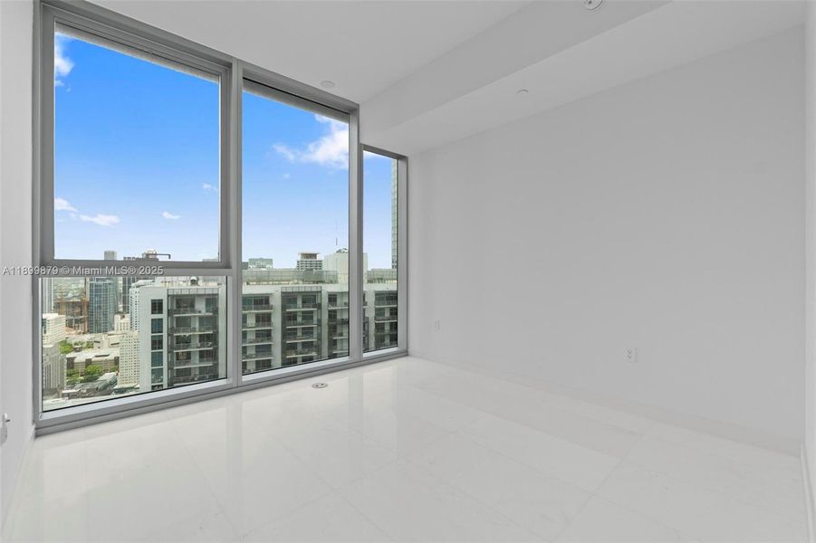 Spacious, unfurnished interior of a new home in Aston Martin Residences, Miami (Image 16).