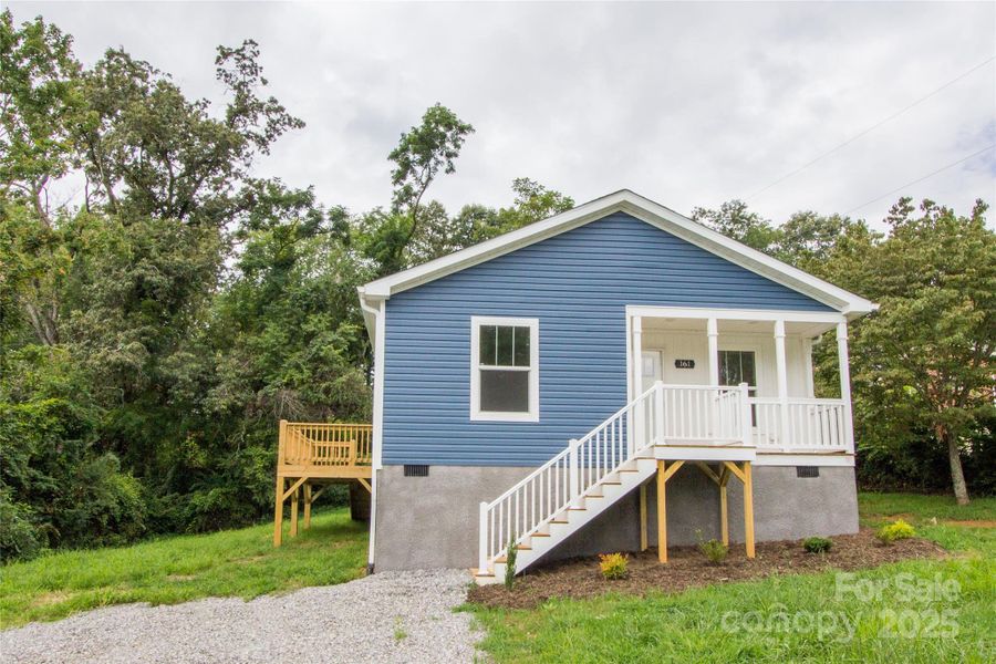 Front exterior of a new home in , Canton, NC, highlighting curb appeal (Image 1).
