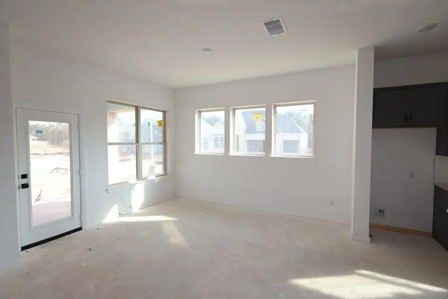 In-progress construction of a new home in Escondido 60' Homesites, Magnolia, TX (Image 5).