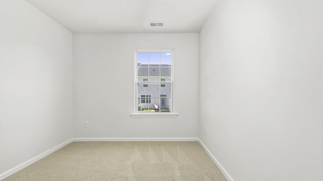 Spacious, unfurnished interior of a new home in North Village Townes, Greensboro (Image 13).