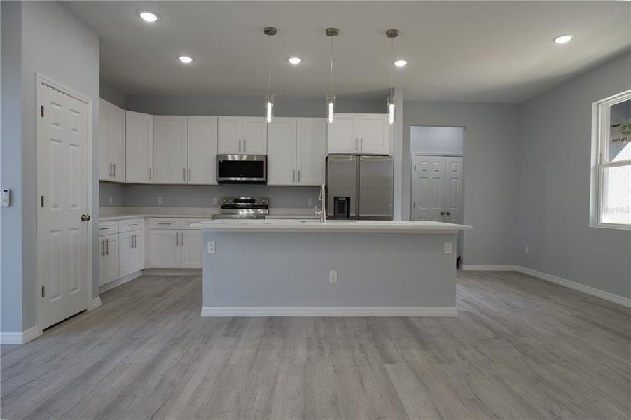 Furnished interior view inside a new home in , Sebring (Image 7). Furnished interior view inside a new home in , Sebring (Image 7).