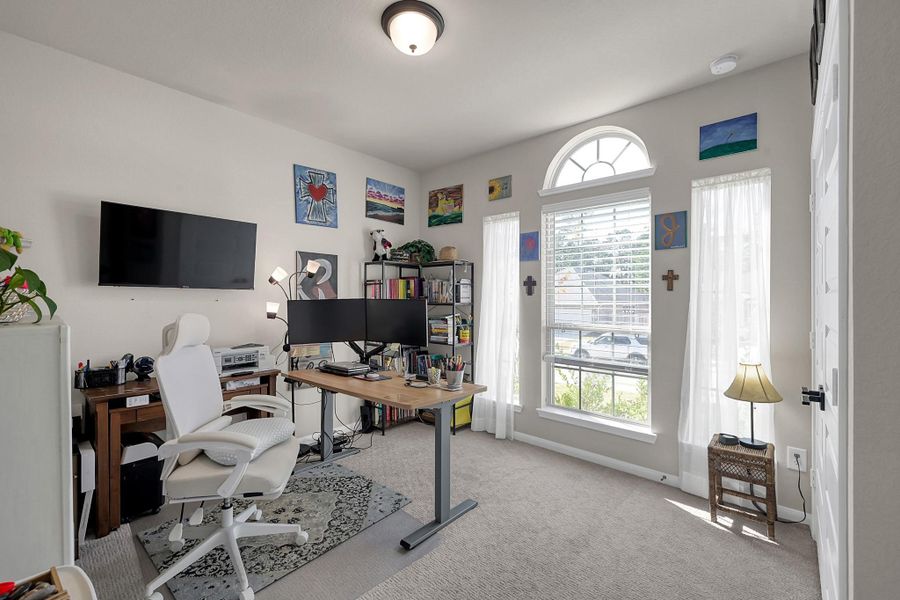 Secondary bedroom #2 currently being used as an office space.