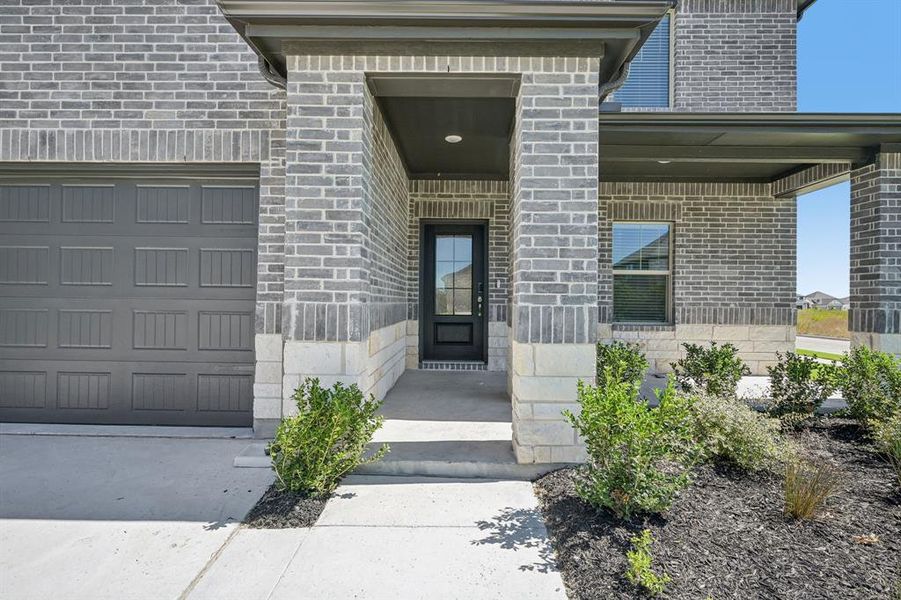 Exterior details and patio area of a home in Lakehaven - Signature Series, Farmersville (Image 23).