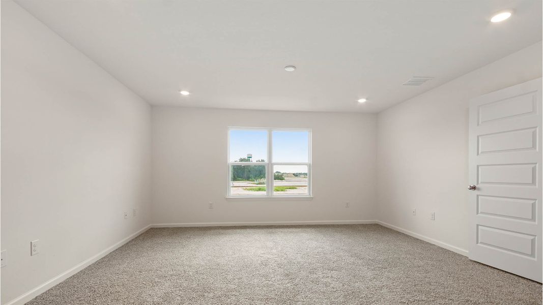 Spacious, unfurnished interior of a new home in Ashton Park Phase III, Freeport (Image 8).