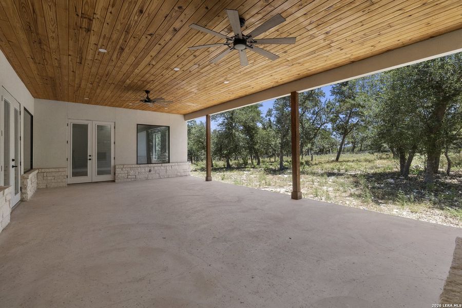 Exterior details and patio area of a home in , New Braunfels (Image 26).
