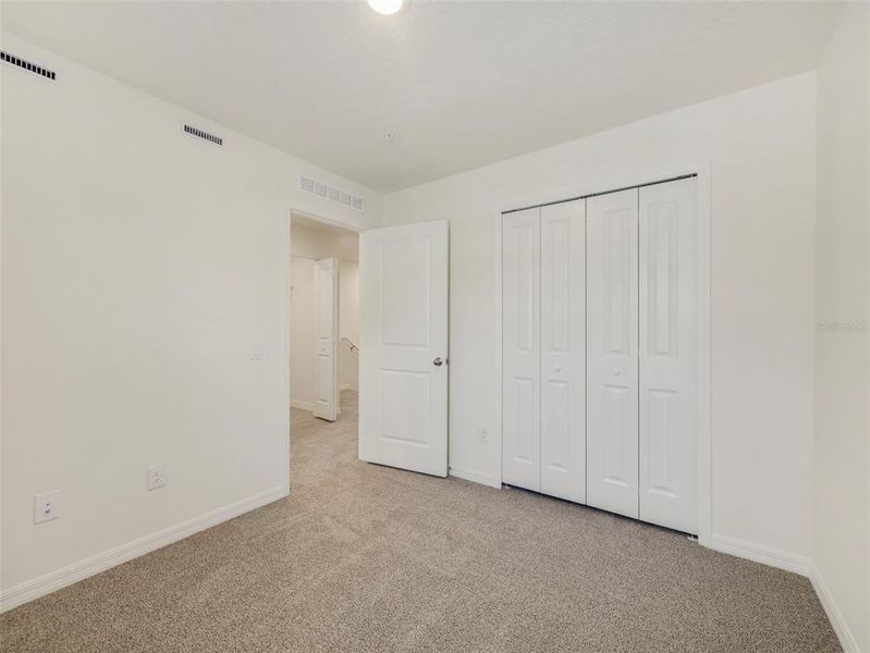 Spacious, unfurnished interior of a new home in Towns at Riverwalk, Sanford (Image 20).