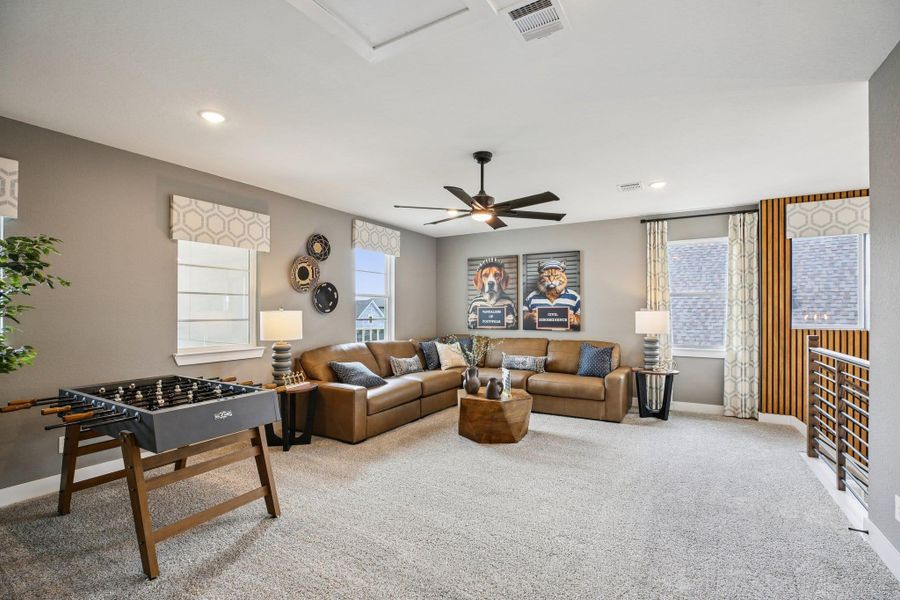 Furnished interior view inside a new home in Bridgeland, Cypress (Image 34).