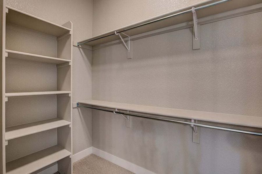 Primary Closet - Not Actual Home - Finishes May Vary