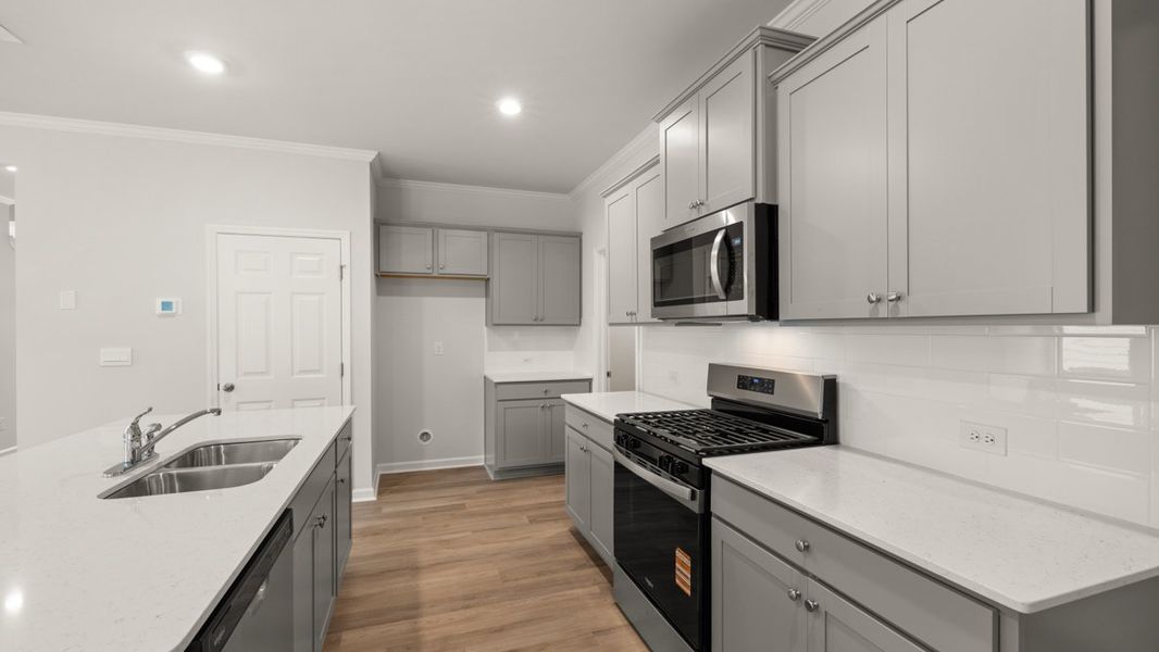 Representative furnished interior of a home built from the Robie by D.R. Horton in Lost Creek, Dallas (Image 11).