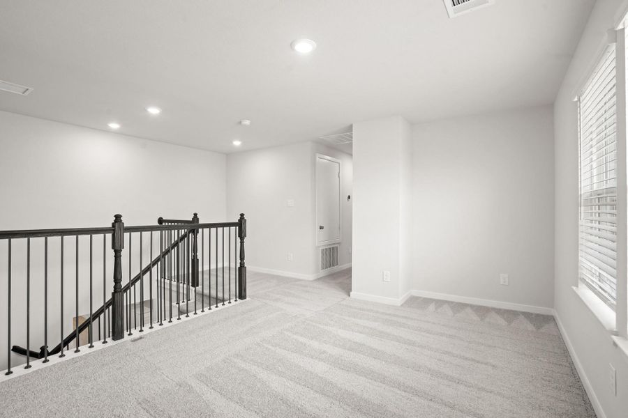 Spacious, unfurnished interior of a new home in Sunterra, Katy (Image 17).