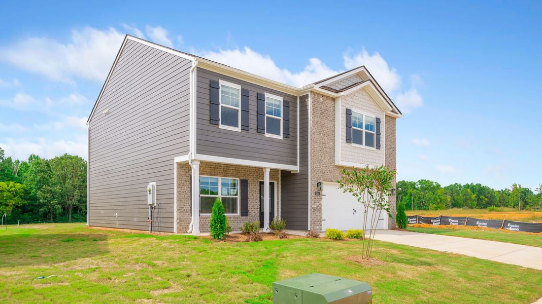 Front exterior of a new home in Fairview Hills, Cleveland, TN, highlighting curb appeal (Image 2). Front exterior of a new home in Fairview Hills, Cleveland, TN, highlighting curb appeal (Image 2).