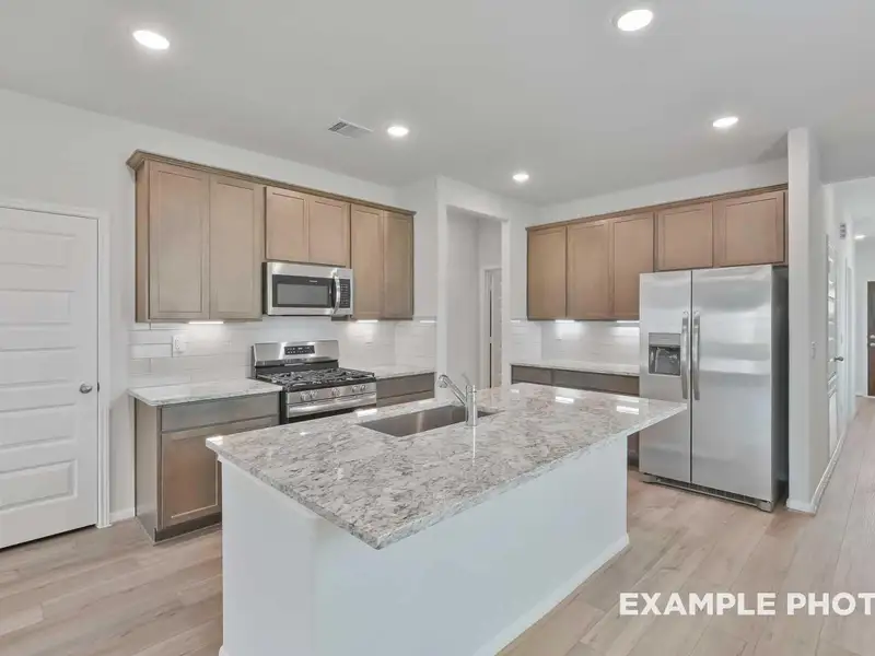 Furnished interior view inside a new home in Caney Creek Place, Conroe (Image 6).