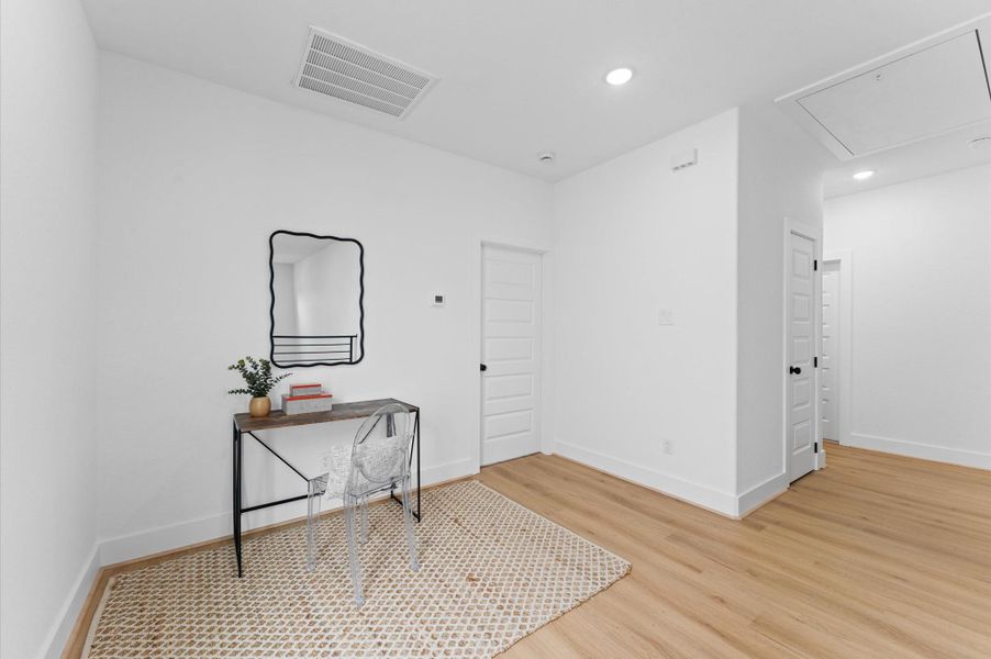 This flex space at the top of the stairs provides an excellent spot for an office, playroom, craft room, or anything else that fits your lifestyle.