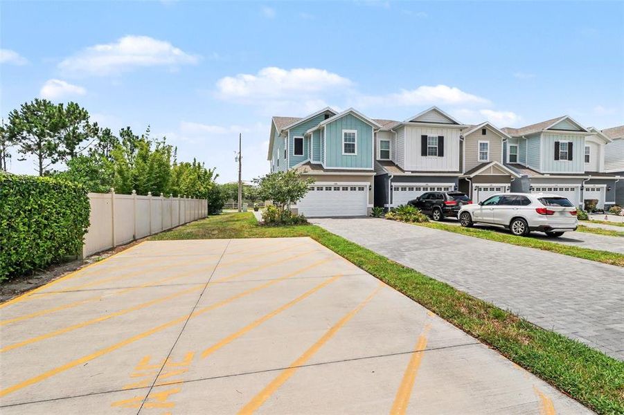 Front exterior of a new home in , St. Cloud, FL, highlighting curb appeal (Image 23).