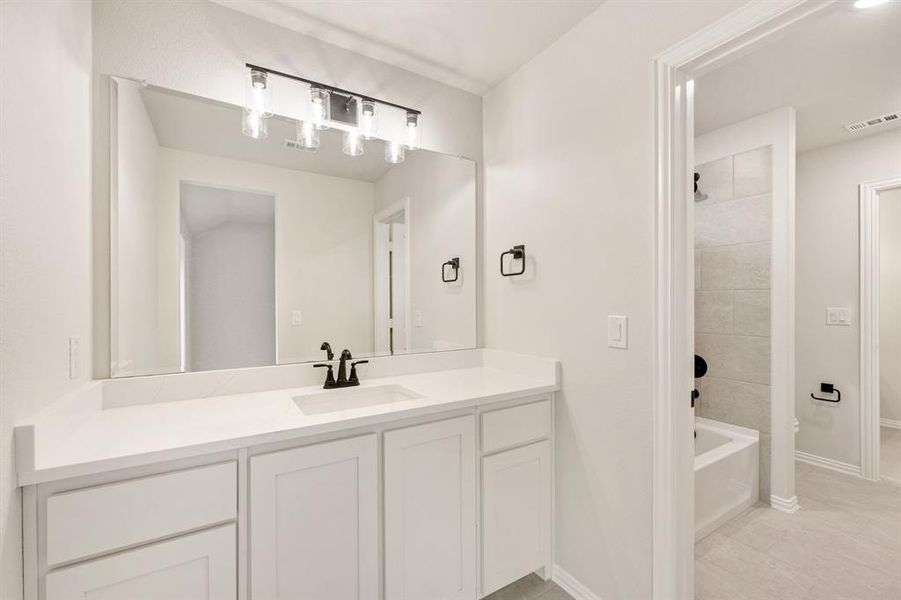 Furnished interior view inside a new home in Villages of Hurricane Creek, Anna (Image 16).