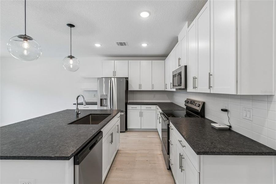 Furnished interior view inside a new home in Aspire at Canter Creek, Davenport (Image 10).