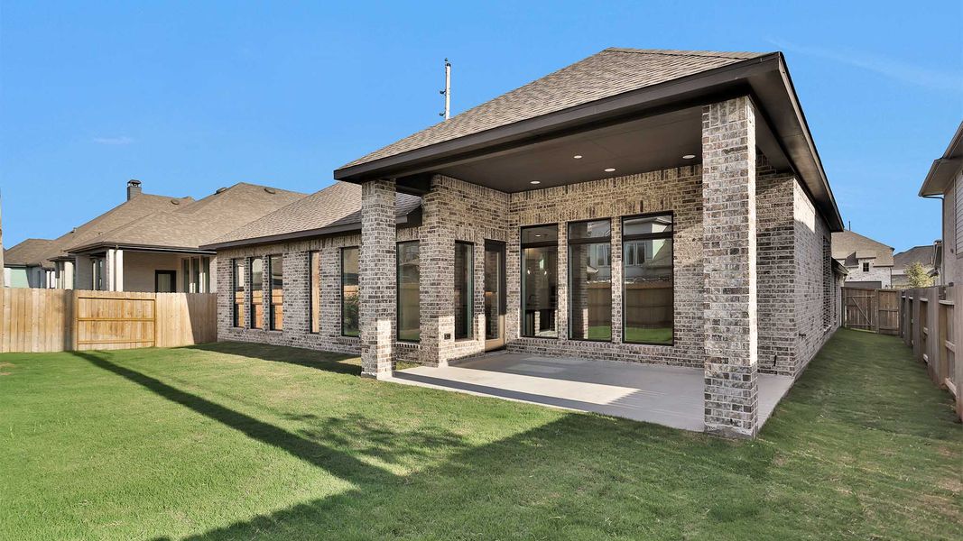 Exterior details and patio area of a home in Fulbrook On Fulshear Creek 60', Fulshear (Image 3).