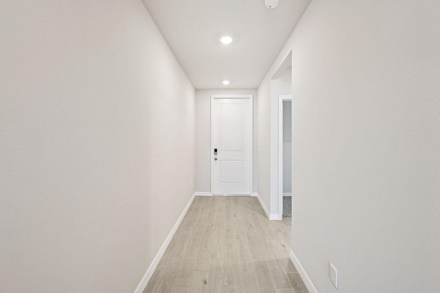 Furnished interior view inside a new home in Hampton Park - Classic Series, Vero Beach (Image 9).