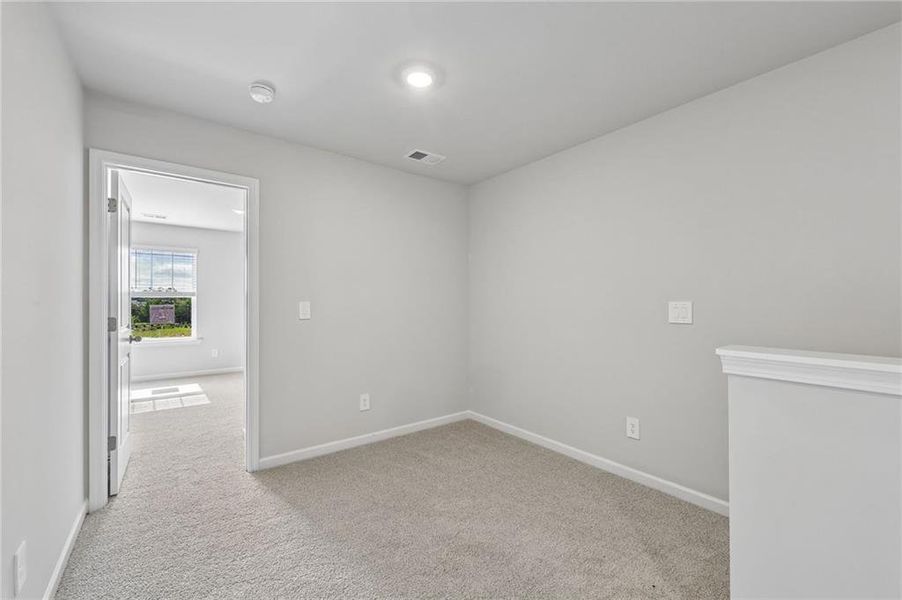 Spacious, unfurnished interior of a new home in Artisan Walk, Fairburn (Image 18).