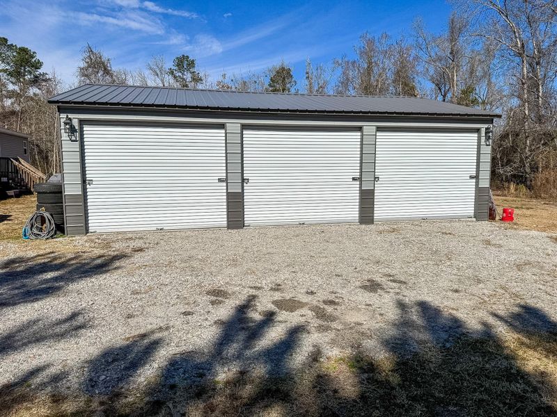 Exterior details and patio area of a home in , Cottageville (Image 20).