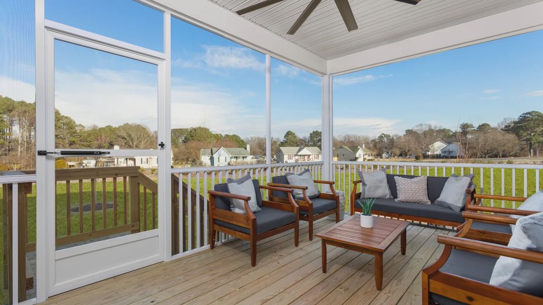 Stonefield home plan rear screened in porch with ceiling fan
