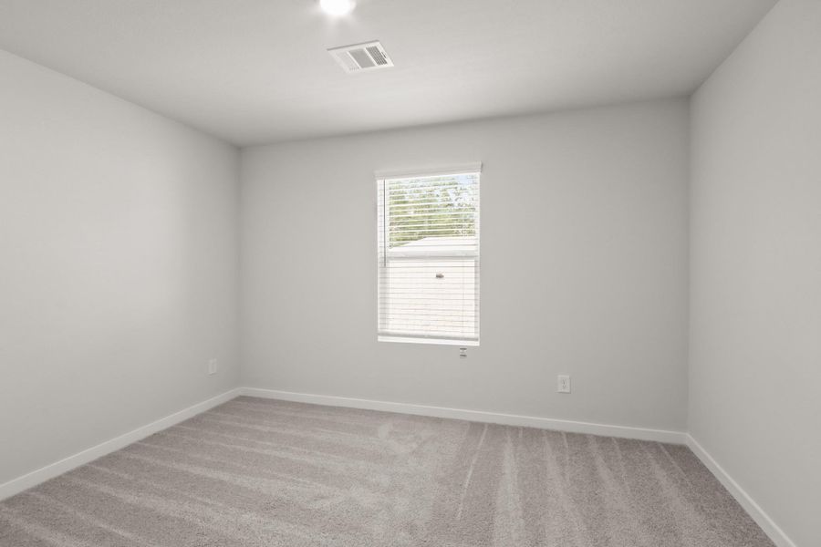 Spacious, unfurnished interior of a new home in Lakes at Crockett Martin, Conroe (Image 18).