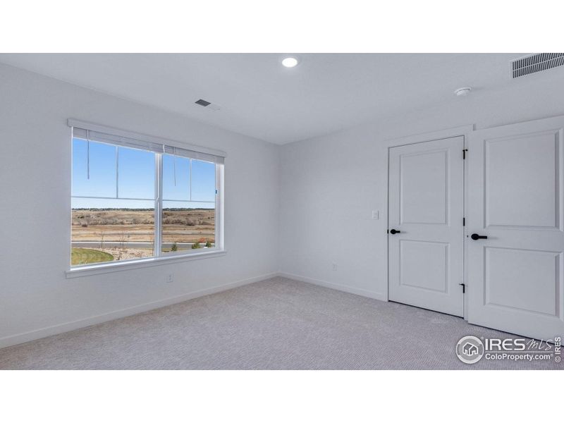 Spacious, unfurnished interior of a new home in Vista Meadows, Fort Lupton (Image 37).