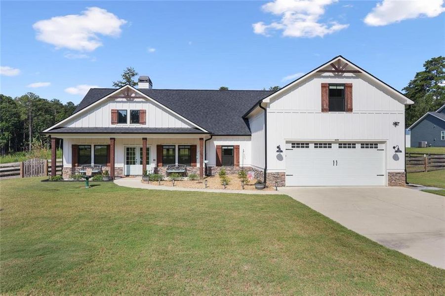 Front exterior of a new home in , Dallas, GA, highlighting curb appeal (Image 23).