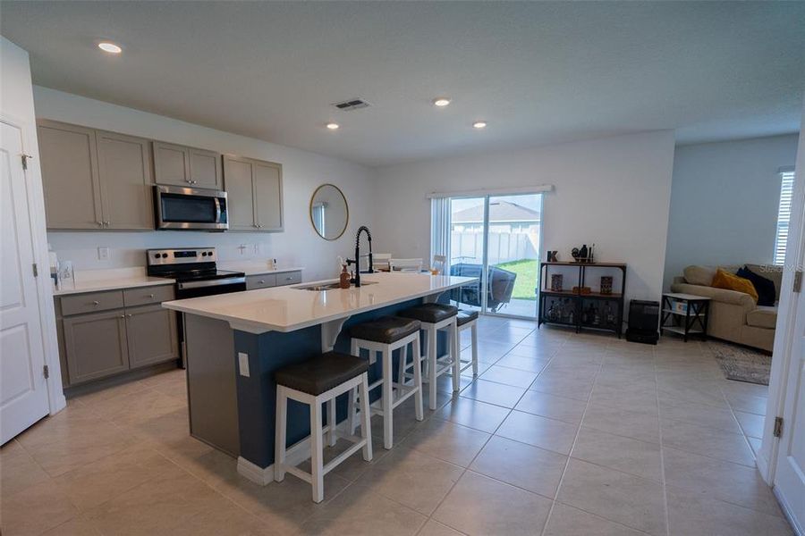Furnished interior view inside a new home in Harmony at Lake Eloise, Winter Haven (Image 5).