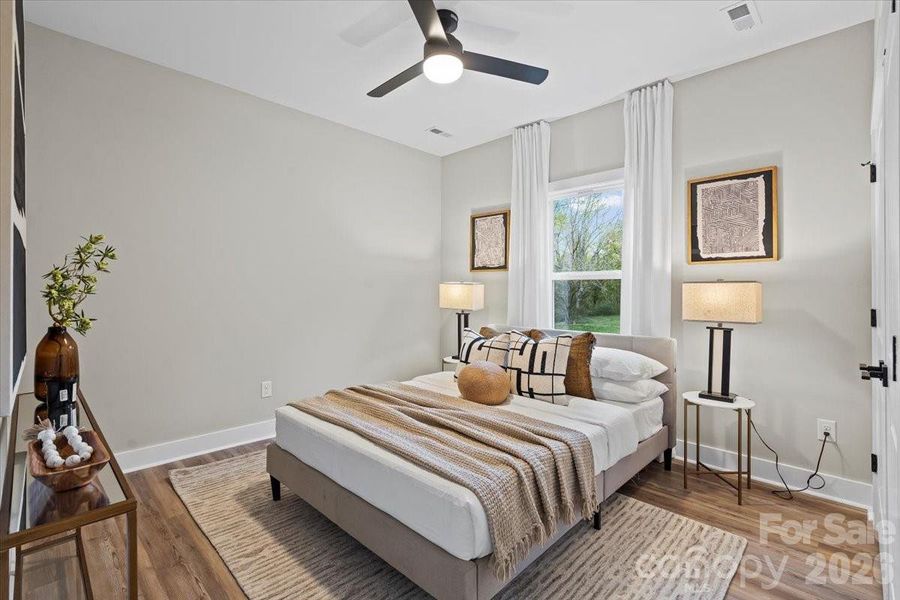 Photo of nearly identical home so you can see the space with furniture.