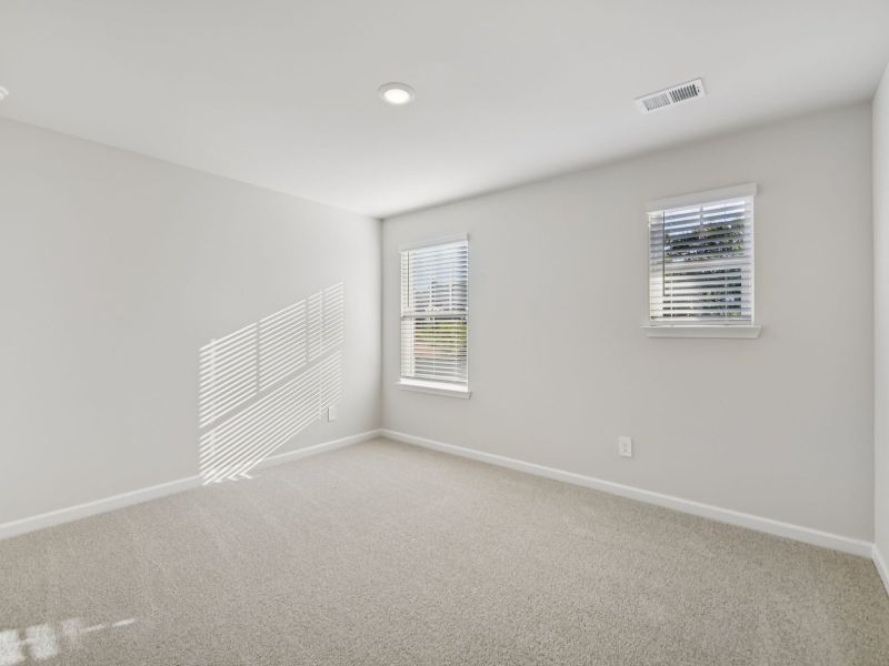 The Taylorsville floorplan with the Divine White interior package.