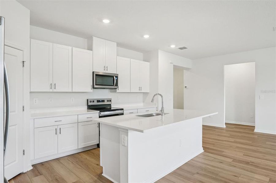 Furnished interior view inside a new home in Two Rivers - Classic Series, Zephyrhills (Image 17).