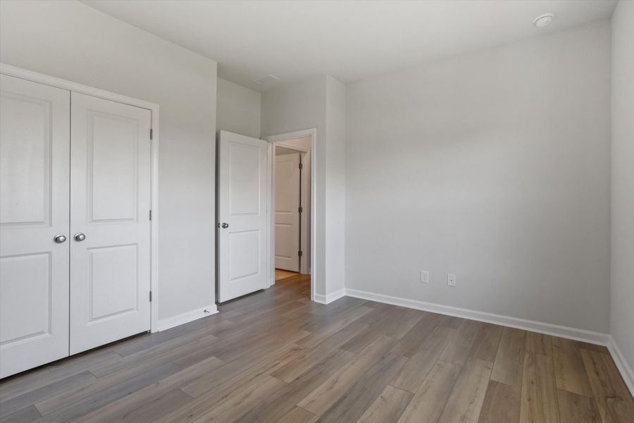 Spacious, unfurnished interior of a new home in Cambridge Reserve, Angier (Image 19).