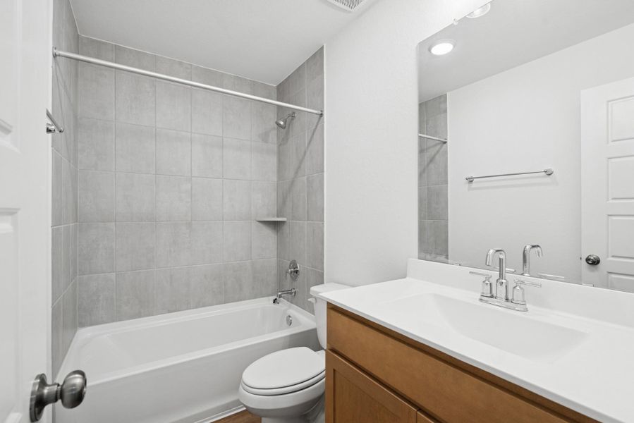 Furnished interior view inside a new home in Pinewood at Grand Texas, New Caney (Image 2). Furnished interior view inside a new home in Pinewood at Grand Texas, New Caney (Image 2).