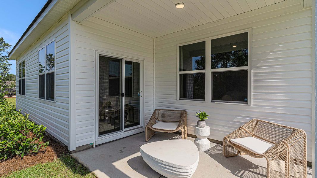 Front exterior of a new home in Meadow Walk, Loris, SC, highlighting curb appeal (Image 2).