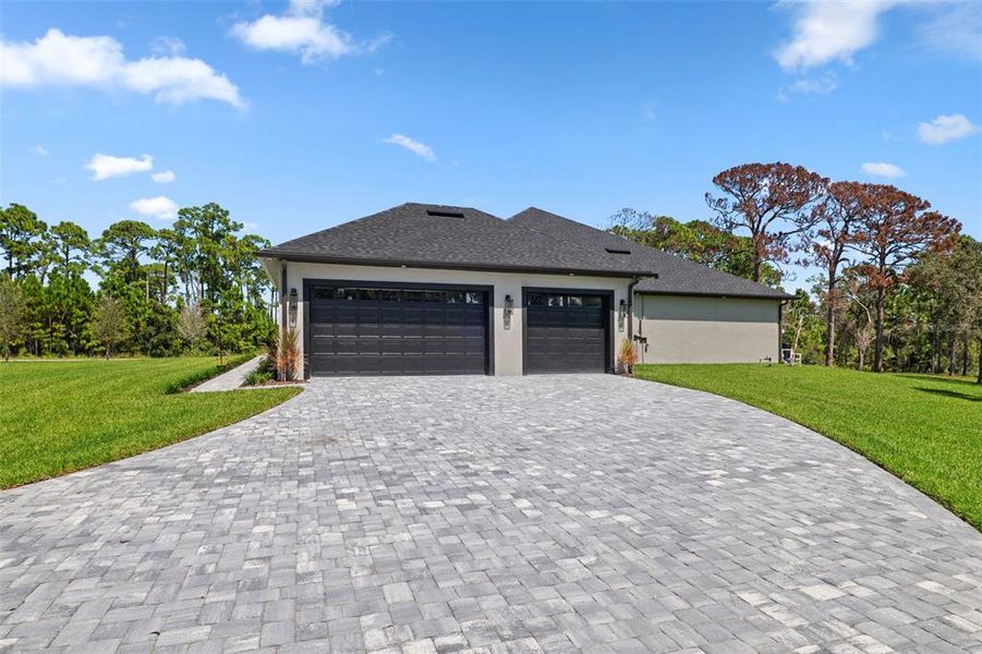 Front exterior of a new home in , Malabar, FL, highlighting curb appeal (Image 28).