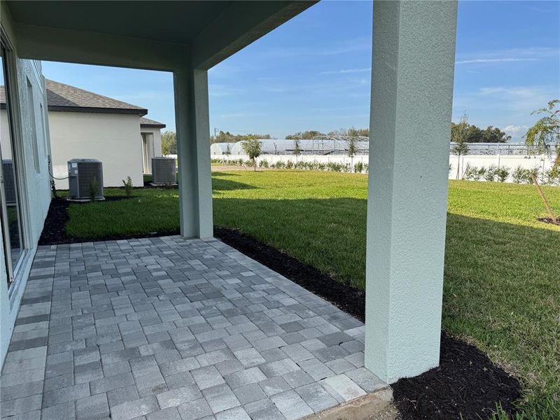 Exterior details and patio area of a home in Southpointe, Palmetto (Image 6).
