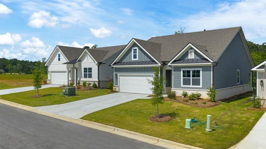 Front exterior of a new home in Hamptons at Riverwood North, Dallas, GA, highlighting curb appeal (Image 19).