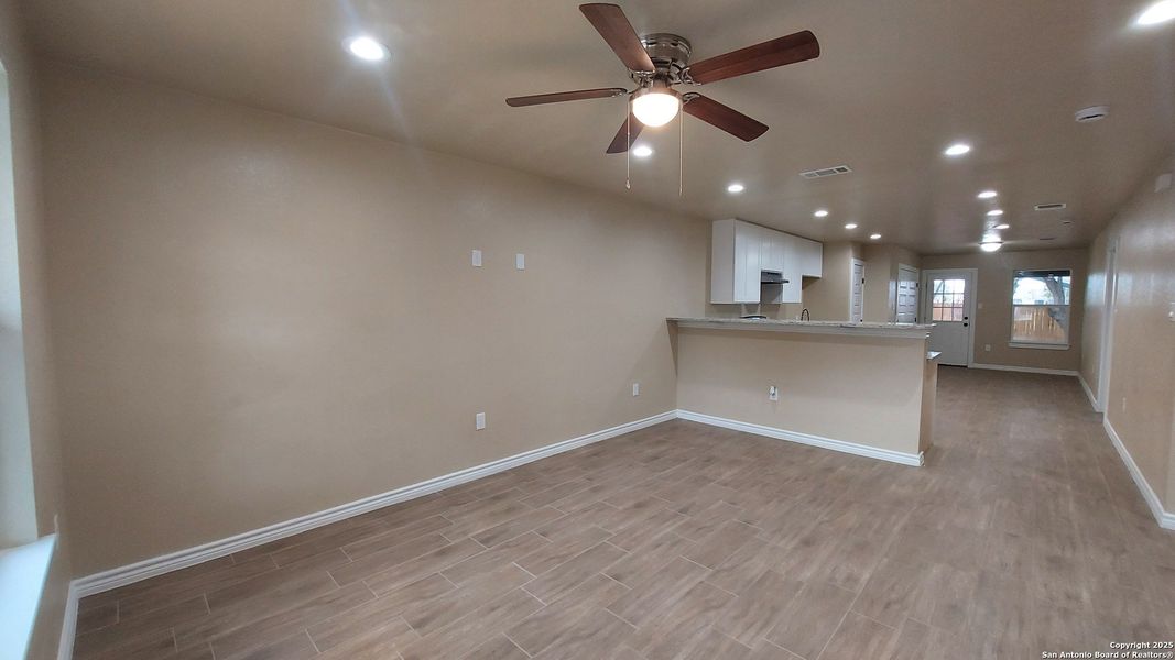 Spacious, unfurnished interior of a new home in , San Antonio (Image 9). Spacious, unfurnished interior of a new home in , San Antonio (Image 9).