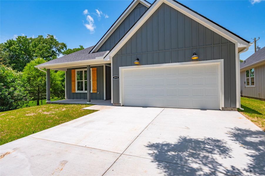 Front exterior of a new home in , Texas City, TX, highlighting curb appeal (Image 17).